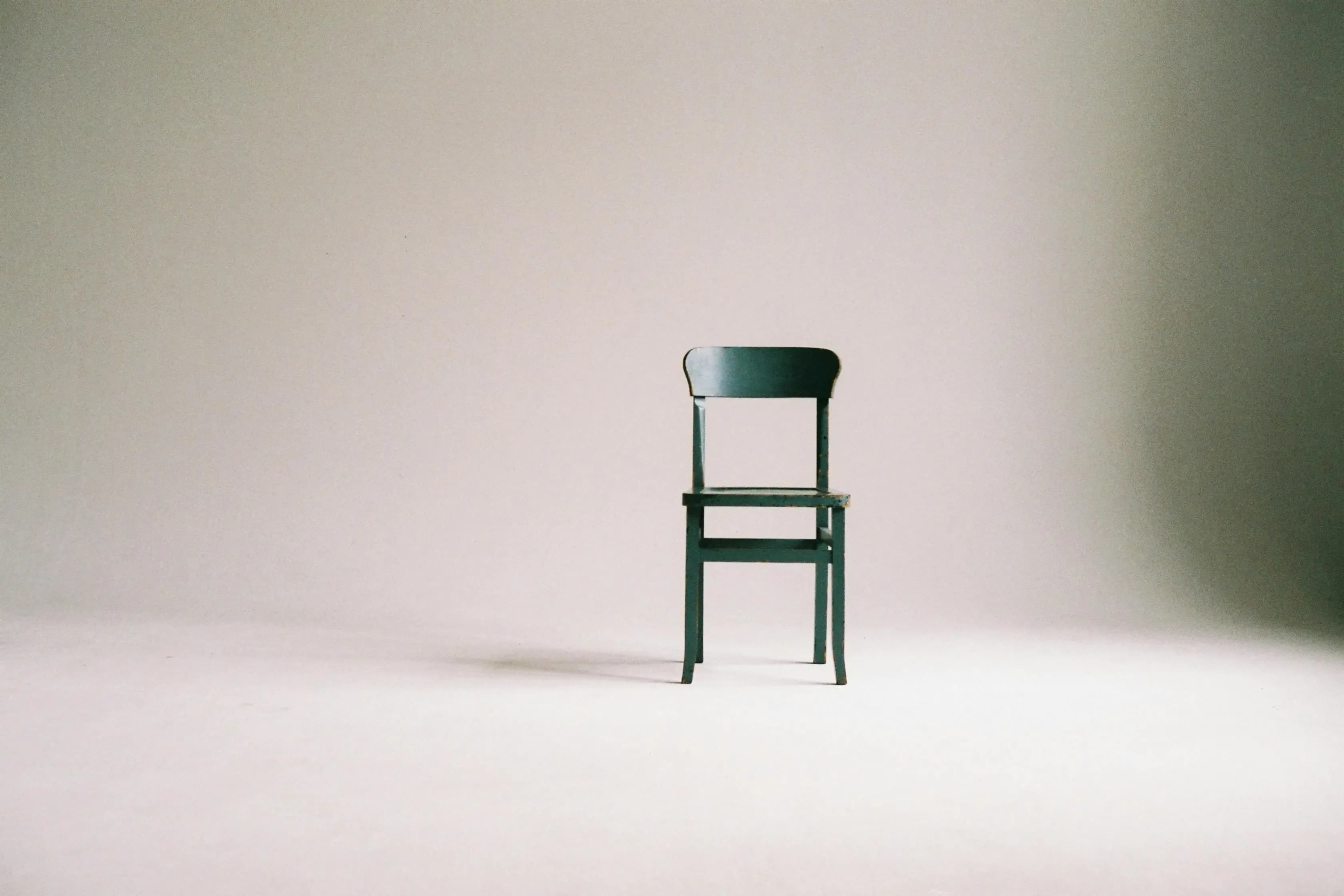 Empty chairs in white background.